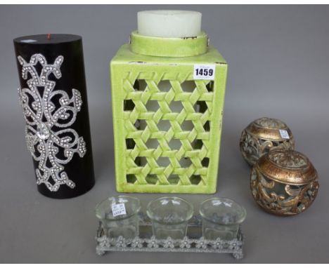 Interior design; a large green glaze pottery lantern with candle, 29cm high, a pair of candles in enamel decorated metal boxe