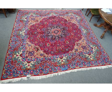 A Mashed carpet, Persian, inscribed, the burgundy carpet with a black faceted medallion, light brown spandrels, all with flor