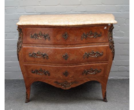 A Louis XV style commode, the serpentine marble top over a gilt metal mounted marquetry inlaid bombe three drawer base, 106cm