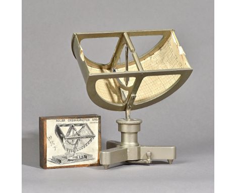 A Fergusons chronometer by J.S. Enright, 1923, with adjustable top and triform base and a wooden printing block depicting a s