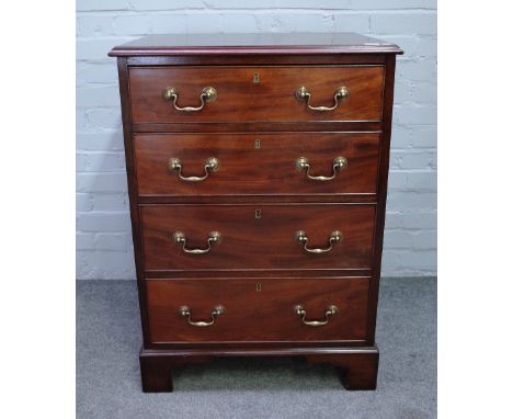 A George III mahogany chest with four long graduated drawers on bracket feet, 64cm wide x 92cm high. 