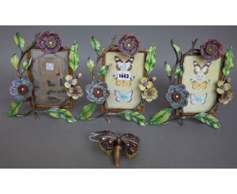 Jay Strongwater; three gilt metal and enamel strutback photograph frames each with foliate and hardstone decoration, 23cm hig