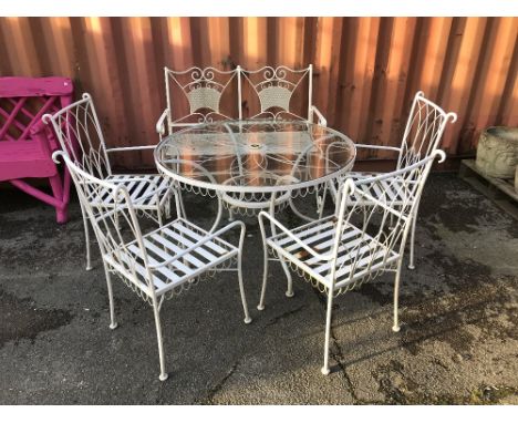 A set of four 20th century white painted metal garden chairs and a similar two seater bench, (5). 