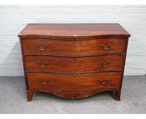 A George III inlaid mahogany serpentine chest of three long graduated drawers, on splayed bracket feet, 119cm wide x 86cm hig