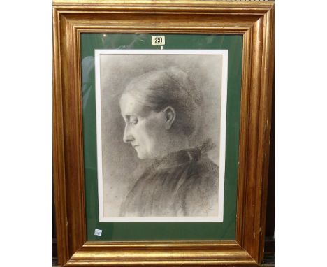 English School (19th century), Profile portrait of a lady, charcoal, indistinctly signed with monogram, 43cm x 30cm.