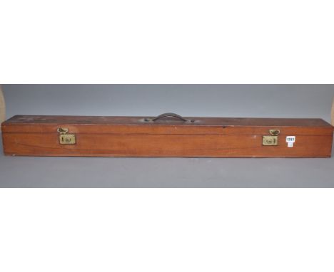 An early 20th century drop down projector screen housed in a wooden carry case, 117cm wide.  