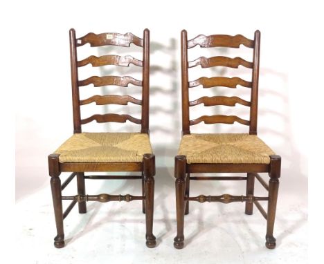 A set of eight 18th century style oak ladder back dining chairs and a 19th century walnut chair, (9).