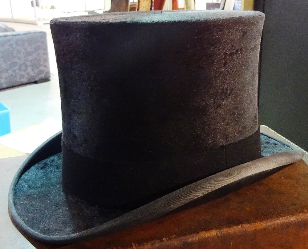 Herbert Johnson, 38 New Bond Street, London; a silk top hat in a brown