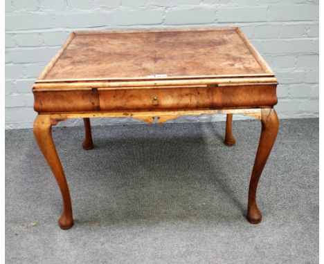 A George III style mahogany silver table, the galleried top with single drawer cushion frieze, on cabriole supports, 73cm wid