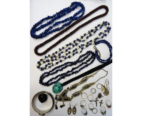 A group of jewellery, comprising; a garnet bead necklace, three further bead necklaces, a carved turquoise matrix pendant of 