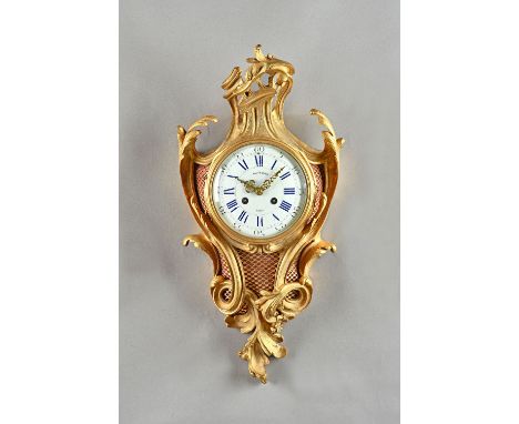 A French ormolu Cartel clock, late 19th century, the 5.5 inch enamel dial detailed 'Balthazard Paris', enclosing a two train 