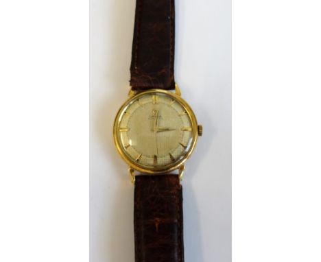 An Omega Automatic gold, circular cased gentleman's wristwatch, the jewelled movement detailed  Omega Watch Co Swiss Seventee