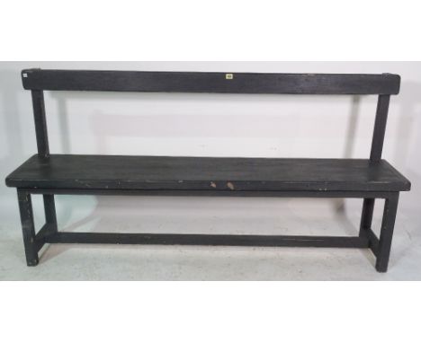 An early 20th century black painted hall bench on block supports, 153cm wide x 92cm high. 