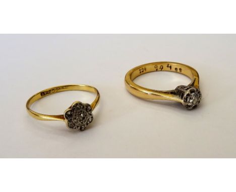 A gold and diamond single stone ring, claw set with a circular cut diamond, ring size K and a half and a gold and platinum, d