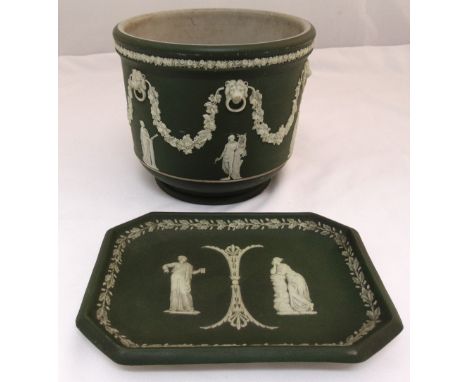 A Wedgewood green Jasperware jardiniŠre of cylindrical form, the sides with applied classical figures, lion masks and vine sw