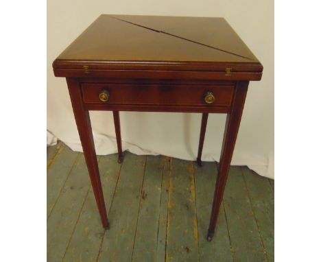 A mahogany envelope card table on tapering rectangular legs, the single drawer with brass handles, 78 x 50.5 x 50.5cm