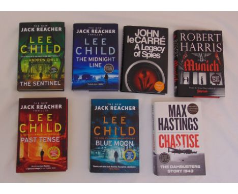 Seven first edition signed hardback books with original dust jackets to include titles by Lee Child, Max Hastings, John le Ca