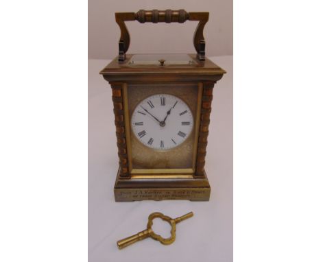 A French repeating carriage clock of customary form with white enamel dial and Roman numerals, engraved details dated 1888, t