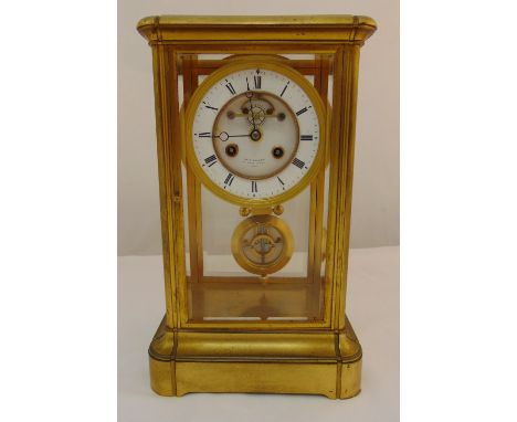 John Walker of Regent Street London a brass and glass two train movement mantle clock with white enamel dial and Roman numera