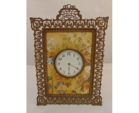 A late 19th century rectangular easel clock with pierced brass frame, the mount painted with butterflies, flowers and leaves,