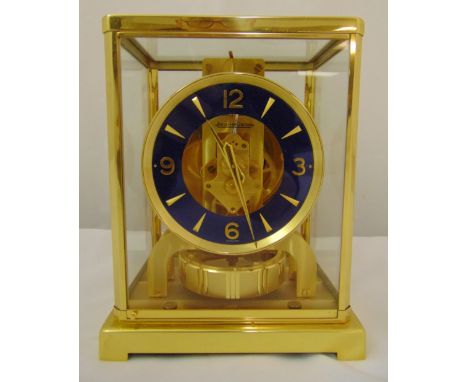 Jaeger LeCoultre Atmos Elysee, gilded brass and glass with blue chapter ring and Arabic numerals