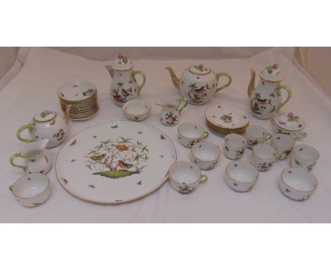 Herend tea and coffee set decorated with birds and butterflies to include cups, saucers, a coffee pot, a hot chocolate pot, t