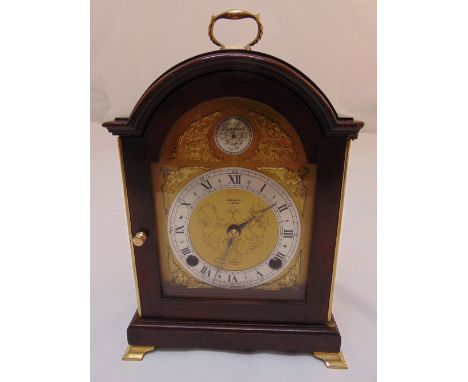 A bracket clock by John Walker of London in 18th century style with arched top, silver chapter ring with Roman numerals on fo