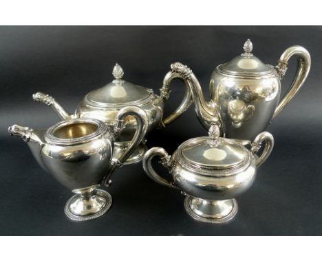 A 20th century Italian 800 silver tea service, with pineapple finials, lappet rims and zoomorphic fish spouts, comprising tea