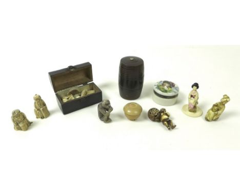 A collection of 19th century ivory and collectables including a 19th century bone pendant carved as a bullet containing two m