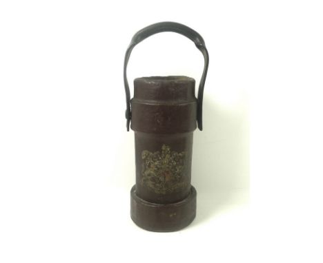 A late 19th century painted canvas shell carrier, with shaped leather handle, transfer printed Royal coat of arms with King's