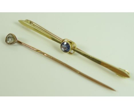 A stick pin set with pear shaped diamond to the top, stone approximately 5 by 3.9 by 1.5mm, early to mid 20th century, on a y