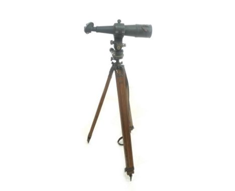 A WWI French sighting scope, the top section marked E.Zion, Paris X-6778, 9 by 51cm, the tripod base stamped Eclair with leat