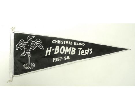 A black pennant flag commemorating H-Bomb tests on Christmas Island 1957-58, 42 by 16cm.Provenance: belonged to the vendor's 