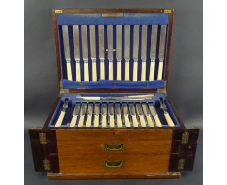 A oak cased canteen of silver plated cutlery, twelve place settings, including knives, forks, teaspoons, dessert spoons, soup