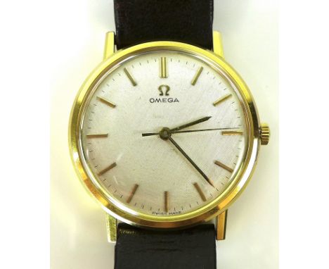 An Omega gold plated and steel cased gentleman's wristwatch, early 1980s, circular silvered dial, gold batons and arrow hands