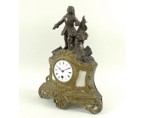 A 19th century French figural mantel clock, with bronzed metal figure surmount modelled as a standing chevalier, the gilt bod