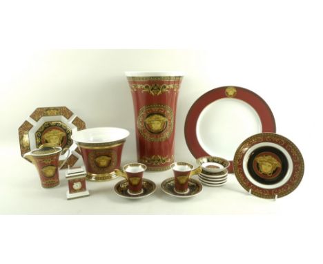 A collection of modern Versace Rosenthal studio ceramics, decorated with conventional Medusa head on red ground with gilded s