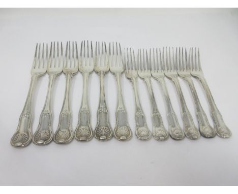 Six George III and later silver Dinner and Dessert Forks, hour glass pattern, engraved initial S, London 1808, 1819, etc, 107