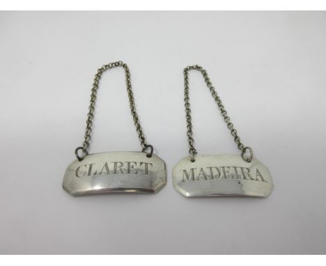 A George III silver octagonal Label, Madeira, London 1814, maker: Phipps &amp; Robinson, and another Claret, London 1815, mak