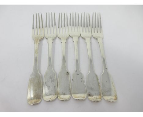 Six early 19th Century silver Dessert Forks fiddle pattern engraved crest of lamb and flag, London 1835 and 1849, 295gms 