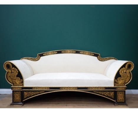 A Regency style large Sofa with ebonised frame painted dolphins in gilt and with floral motifs, 7ft 10in W 