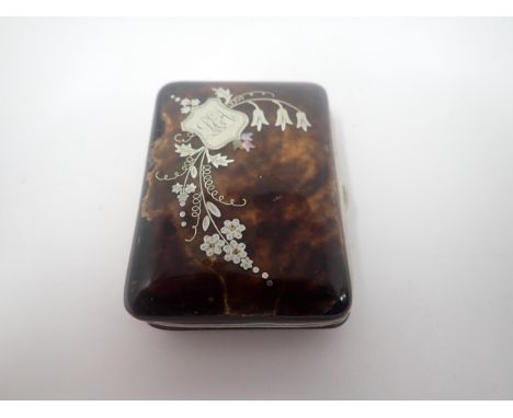 A small tortoiseshell Purse with silver and mother-of-pearl floral and cartouche inlay 