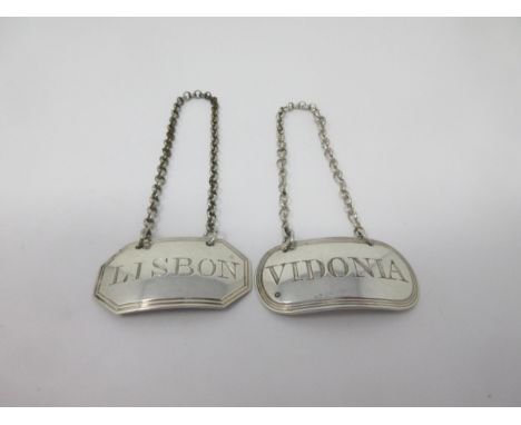 A George III silver octagonal Label, Lisbon, London 1807, and another, Vidonia, London 1814, both by Elizabeth Morley 