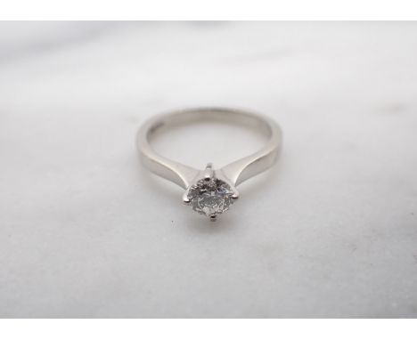 A Diamond single stone Ring claw-set brilliant-cut stone, 0.35cts, in platinum, ring size H 1/2