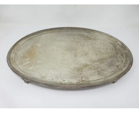 A George III silver oval Salver with beaded rim on shaped bracket feet, London 1786, 16 x 12in, 1350gms, maker: John Wakelin 