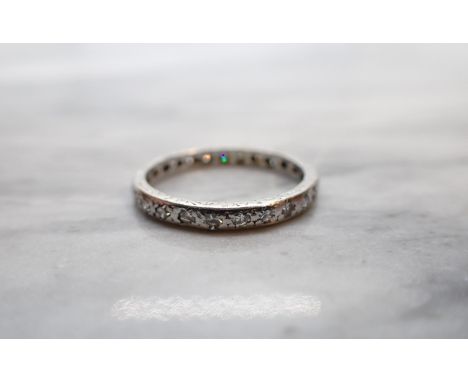 A Diamond Eternity Ring rubover-set eight-cut stones, ring size O, approx 2.90gms 