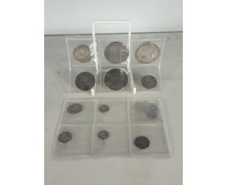 A small collection of silver Coins, to include an Elizabeth I 1575 Threepence, Maundy Odds, William III Crown 1696, a France 