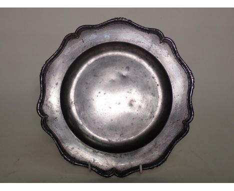 An 18th Century Pewter Dish, Stynt Duncombe, Bewdley, with silver shape rim, 9 1/2 in diam 