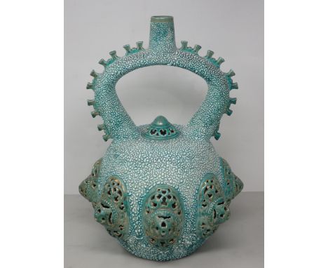 A Hungarian Zsolnay-Pecs pottery Vase of reticulated bulbous form with gilt detail and green glaze, 15in H, chipped 