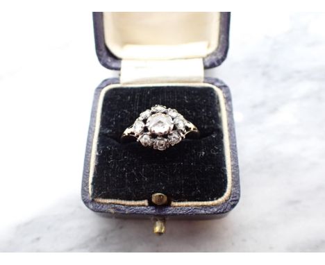 An early 19th Century Diamond Cluster Ring close-set rose-cut stones, ring size N 